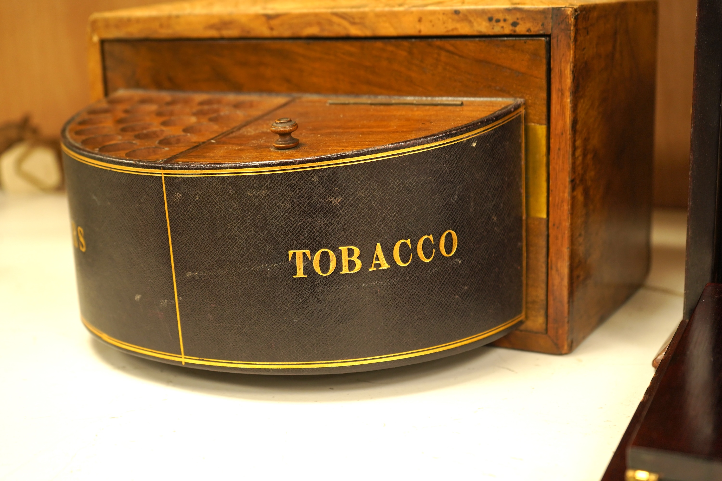 An Edwardian inlaid mahogany writing casket with fitted interior and a late Victorian faded walnut cigar box, largest 32cm wide